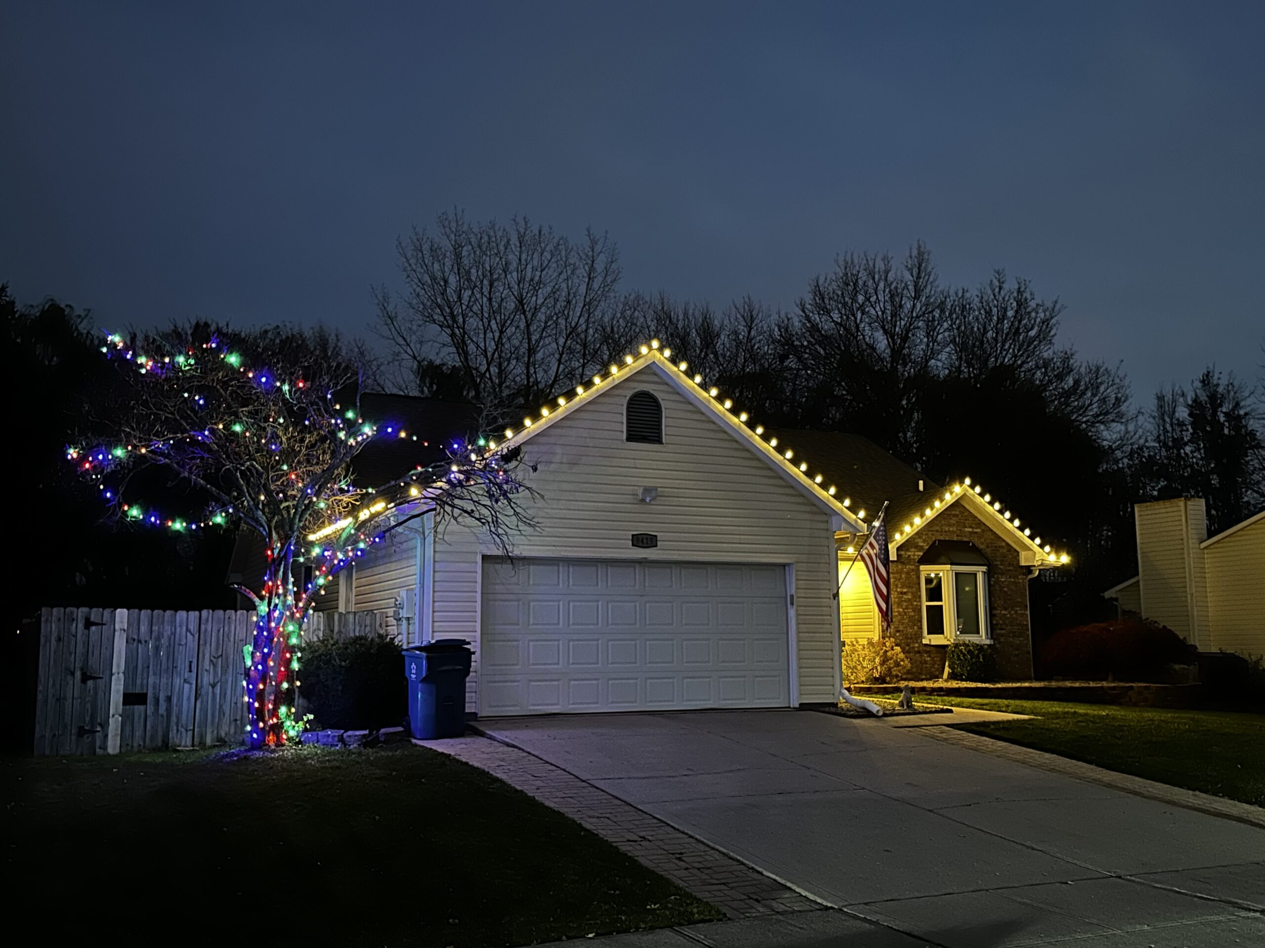 Christmas light roofline installation Indianapolis home